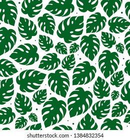 Cute summer seamless pattern created from hand drawn monstera leaves. Tropical theme. Perfect for wallpaper, textile prints, wrapping paper, product package, stationery, scrapbooking design ideas. 
