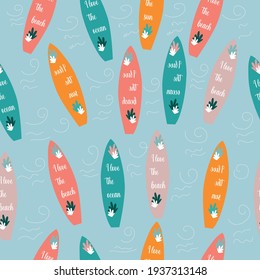 Cute summer seamless pattern of different color surfs with different slogans. Vector illustration on a blue background 