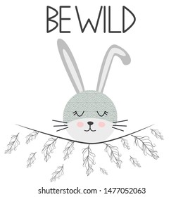 Cute sweet little rabbit smiling face with feathers. Lettering quote Be wild. Graphic design.