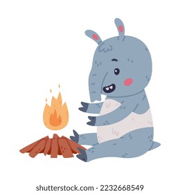 Cute Tapir Animal with Proboscis Sitting Near Burning Fire and Warming Vector Illustration