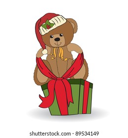 cute teddy bear with a big Christmas gift box
