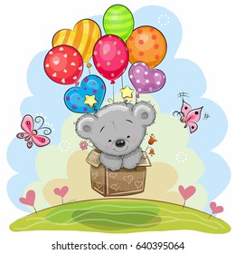 Cute Teddy Bear in the box is flying balloons