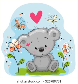 Cute Teddy Bear with flowers and butterflies on the meadow
