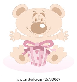 Cute Teddy Bear is given a present and looks happy