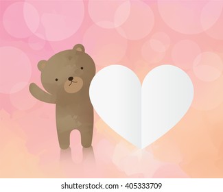 Cute teddy bear with paper heart