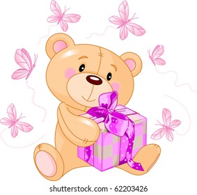 Cute Teddy Bear sitting with pink gift box