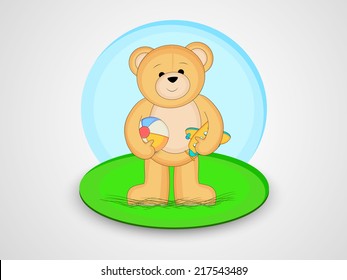 Cute teddy bear toy holding colorful ball and airplane on grey stage. 