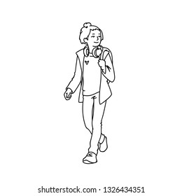 Cute teen girl with headphones and backpack taking a walk. Monochrome vector illustration of teenage girl in jacket, jeans and sneakers walking in simple line art style. Black lines isolated on white 