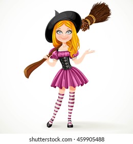 Cute teenage red haired witch in purple dress with a broom on her shoulder isolated on white background