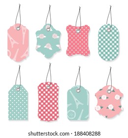 Cute textile label tags set in pastel blue and pink colors.