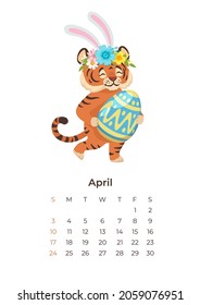 Cute tiger April 2022 calendar A4 format template. Adorable funny tiger holding an Easter egg isolated on white background. Wall poster, calendar page and kawaii cartoon character. Month planner 