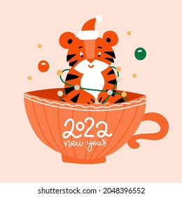 Cute tiger character sitting in big cup. Christmas and New 2022 year greeting card. Funny postcard with animal symbol of the year. Flat vector illustration.