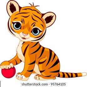 Cute tiger cub playing with red boll