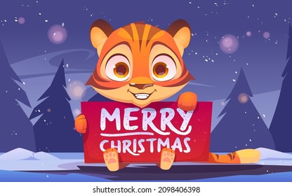 Cute tiger holding banner with Merry Christmas congratulation. Wild funny kitten in winter forest with fir-trees around. Animal cub xmas character with greeting card, Cartoon Vector illustration