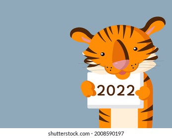 Cute tiger holding a sign with the inscription of the year. 2022 new year. Banner for New Year's greetings with a red tiger. Chinese New Year