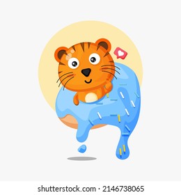 Cute tiger on a donut cartoon icon