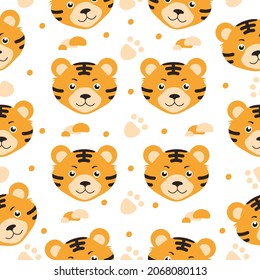 Cute tiger on a white background with dots, spots and footprints. Seamless pattern. Can be used for wallpaper, fill web page background, surface textures