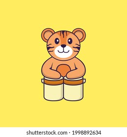 Cute tiger is playing drums. Animal cartoon concept isolated. Can used for t-shirt, greeting card, invitation card or mascot.