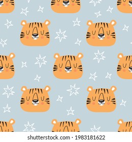 Cute tiger and stars seamless pattern. Hand drawn cute print for posters, cards, t-shirts. Vector illustration.