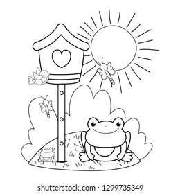 cute toad in the landscape with birdhouse