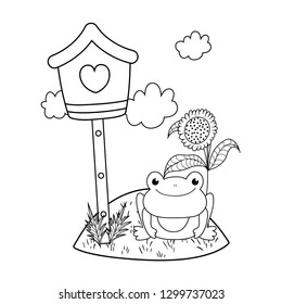 cute toad in the landscape with birdhouse