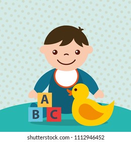 cute toddler boy blocks alphabet and duck toys