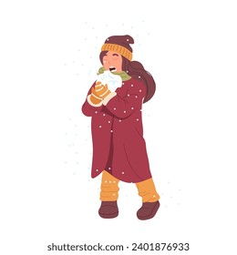 Cute toddler girl cartoon character eating huge snowball enjoying winter weather pastime on vacation