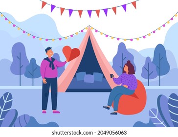 Cute tourist couple on romantic trip to country. Boyfriend giving heart to girlfriend in front of tent flat vector illustration. Camping, glamping, love, romance concept for banner or website design