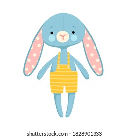 Cute toy rabbit in a yellow jumpsuit with fabric ears. Baby toy concept