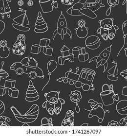 Patrón de juguetes sin costura. Elementos de esquema aislados en el fondo oscuro.  Para fondo, textil, ducha de bebé, impresión de tela, papel de envoltura. Ilustración vectorial dibujada a mano.
