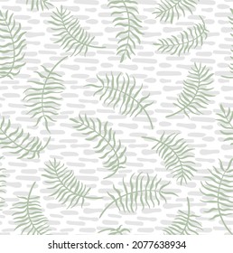 Cute and trendy vector seamless pattern with hand drawn palm leaves and tropical plants. Botanical ornament for printing on fabrics and paper