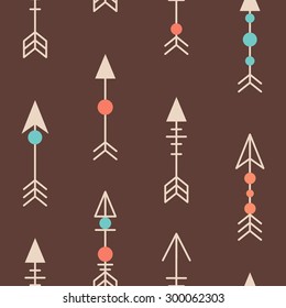 Cute tribal geometric seamless pattern in cartoon style with arrows for fabric and web backgrounds