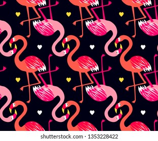 Cute tropical exotic seamless pattern with pink flamingo birds and hearts on black isolated background in vector. Funky bird style flamingo design vector background.