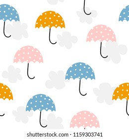 Cute umbrella and clouds seamless pattern. Vector hand drawn illustration.