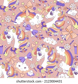 Cute unicorn heads, magic elements and rainbows seamless pattern on pink background. Vector illustration for print, wallpaper, design, decor, goods, bed linen and apparel