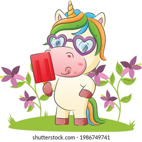 The cute unicorn is holding a delicious ice cream with the bright color in the garden of the illustration