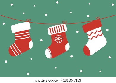 Calcetines de Navidad de vector lindo en un fondo verde