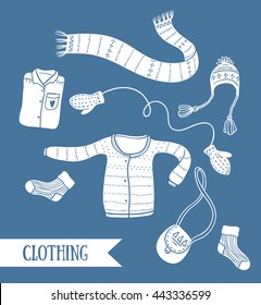 Cute vector collection of handmade clothes isolated on the blue background. 