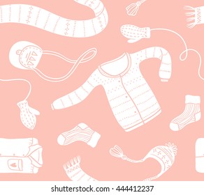 Cute vector collection of handmade clothes isolated on the pink background. Vector seamless pattern.