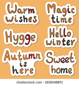 Cute vector hand drawn lettering set in doodle style. Sweet Home, magic time, warm wishes, hello winter, hygge, autumn is here. Isolated on white background.