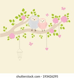 Cute vector holiday card. Funny owls on the branch with fantasy flowers. Can be used for celebration postcard, wedding invitation, etc.