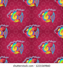 Cute vector illustration with cartoon fish. Nice fish seamless pattern in pink, red and blue colors.
