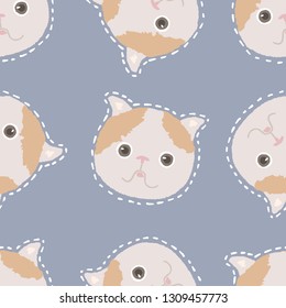 Cute vector pattern of kitties heads on blue background. Seamless illustration of pretty animal portraits.