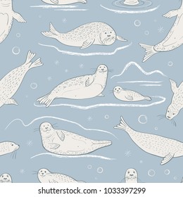 Cute vector pattern with white seals on a gray-blue background