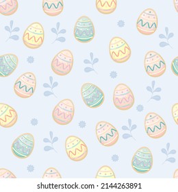 cute vector seamless pattern Easter egg in the form of cookies on the light blue background with blue flower and leaves