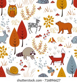 Cute vector seamless pattern with forest plants, birds, bear, deer, raccoon, and fox. Kids autumn background