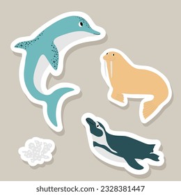 Cute vector stickers set with dolphin, walrus, penguin, corals.Underwater cartoon creatures.Marine animals.Cute ocean illustration for fabric, childrens clothing,book, postcard,wrapping paper