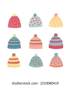 Cute vector winter hats. Multicolored knitted hats.