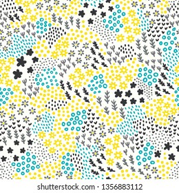 Cute vegetative seamless pattern. Print for textiles hand-drawn in the style of doodle. Tiny flowers, leaves, polka dot elements. Vector illustration.