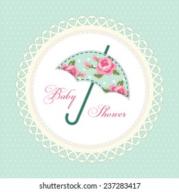 Cute vintage baby shower card with umbrella as fabric applique